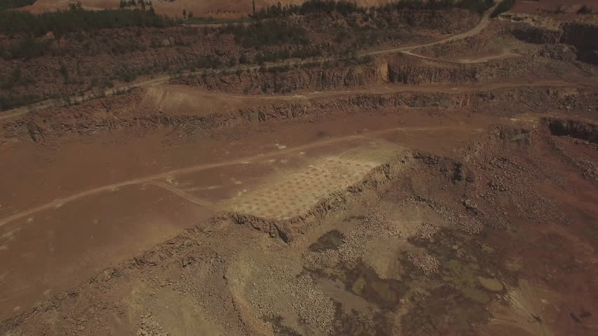 Aerial. Powerful explosion on the open pit mine. Extreme drone shot. 4K Royalty-Free Stock Footage #18042619