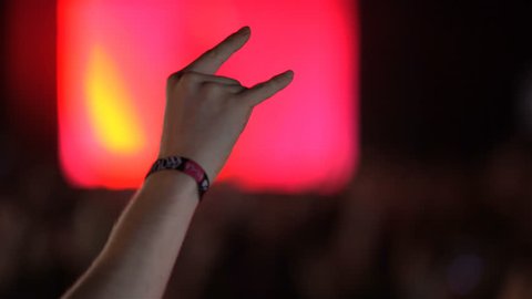 HELSINKI, FINLAND - JUNE 01, 2016: The rock-fan are applauding and waving their hands at a rock concert. Heavy metal rock festival. วิดีโอสต็อก