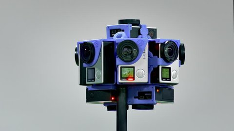 360 Video Camera / Virtual Reality Camera / 3D Video Production. 360 degree camera blinks red diodes, recording a panoramic video. (av24653c) स्टॉक वीडियो
