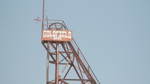Goldfield Ghost Town, AZ, USA - July 16, 2016: 4k close video Goldfield 1893 town sign. It is a reconstructed 1890s town including gold-mine tours, Old West gunfights, a history museum & more.