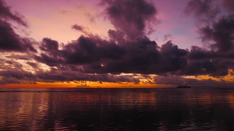 A dark, dramatic sunrise video from Dumaguete shores. A passenger ship can be seen cruising in the horizon. Presented in real time and shot in 4K (Ultra HD) resolution.
