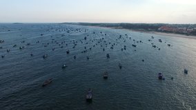 Aerial video over the sea and above a lot of fisherman boats, Asia, Vietnam, Mui NÃ¨.