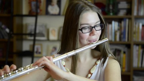 Playing flute. Играет на Recorder. Play the Flute. Girl playing Flute.