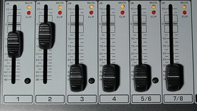 A extreme closeup view of a mixing console volume.
