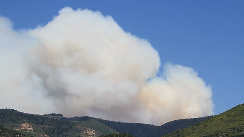 FOUNTAIN GREEN UTAH CIRCA JUNE 2010 Forest fire and smoke above Wasatch Mountain  in central Utah near Fountain Green, Utah