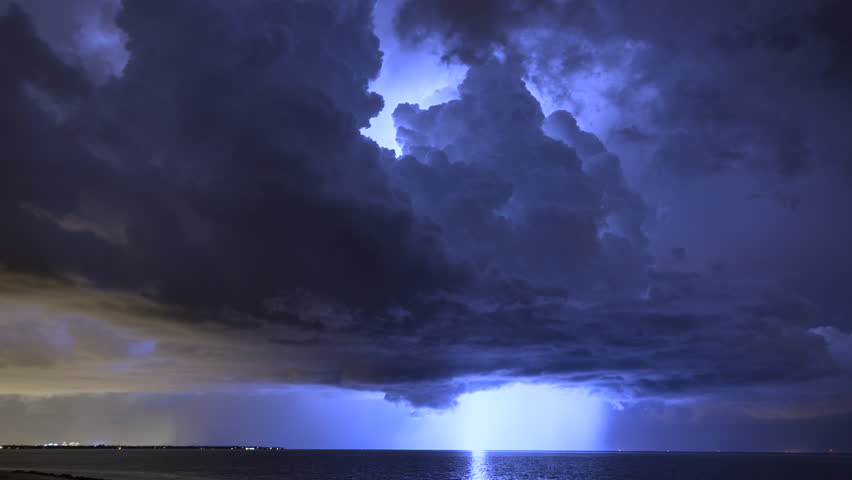 4K UHD - Severe lightning storm time lapse over Tampa Bay Florida waters late at night.