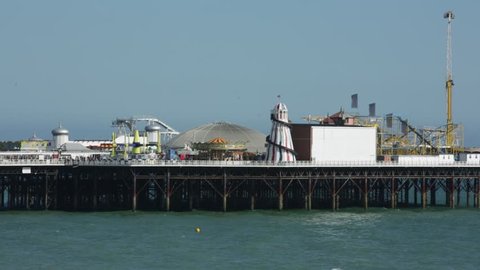 Brighton pier with attractions, England