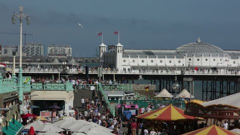 Crowds of people on Brighton Beach, England