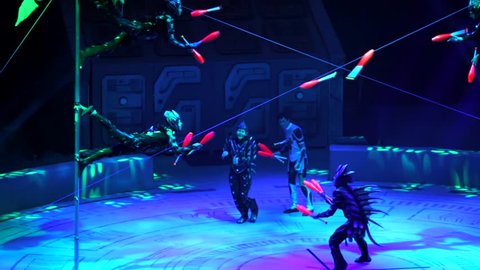 ST. PETERSBURG, RUSSIA - JANUARY 2, 2016: Brothers Zapashny circus, "UFO. Alien Planet Circus" show in Saint Petersburg. Artists in alien costumes juggle under beautiful lights. Amazing show