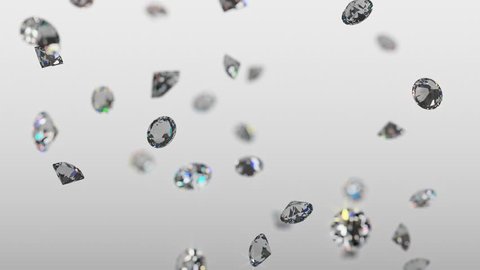 Realistic brilliant diamonds raining down in slow motion with a soft focus and light gray background