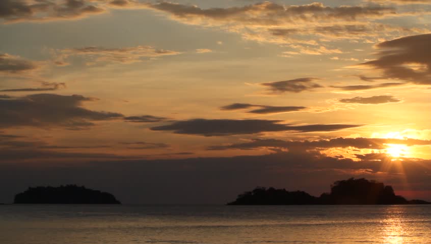 A beautiful sunset over the sea to the islands
