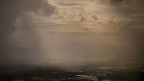 Rain curtaining a view of the mountains.Rain storm over rice fields with curtain of rain - Powered by Shutterstock - Get 15% off with code: PIKWIZARD15