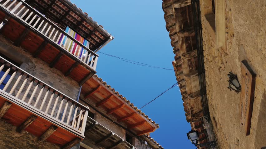 The old houses with balconies in the village of Rupit. The famous landmark of Catalonia and Spain.