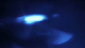 Blue glass lens flares. Seamless loop abstract motion background. Put it with screen or add composite mode above your video for transitions flashes or styling your video
