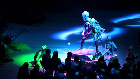 ST. PETERSBURG, RUSSIA - JANUARY 2, 2016: Brothers Zapashny circus, "UFO. Alien Planet Circus" show in Saint Petersburg. Juggler in alien costume juggles with balls in front of the spectators