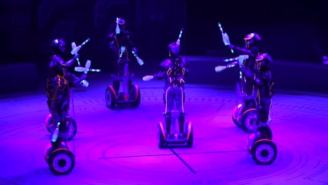 ST. PETERSBURG, RUSSIA - JANUARY 2, 2016: Brothers Zapashny circus, "UFO. Alien Planet Circus" show in Saint Petersburg. Alien jugglers drive on segways and juggle in the dark. Amazing show