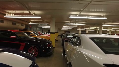 MONTREAL, CANADA - JULY 2016: Luxury Car Dealership Garage - Steadicam Flow