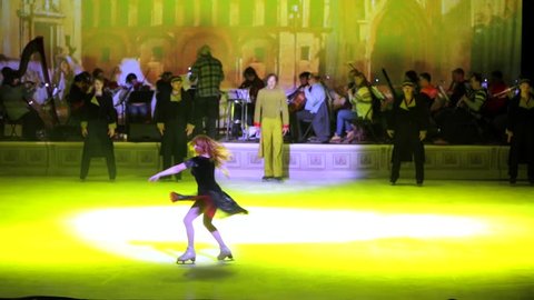 MOSCOW, RUSSIA - JANUARY 12, 2016: Full rehearsal of theater of ice miniatures perfomance anniversary program "We are 30" under direction of Igor Bobrin. Beautiful actress dances solo on skating rink