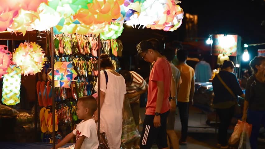 CHIANG MAI,THAILAND - CIRCA July 2016 :locals shopping for sandals at the Sunday market
