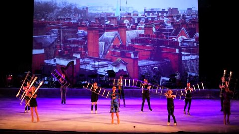 MOSCOW, RUSSIA - JANUARY 12, 2016: Full rehearsal of theater of ice miniatures perfomance anniversary program "We are 30" under direction of I.Bobrin. Artists dance on ice with ladders.