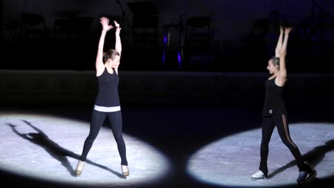 MOSCOW, RUSSIA - JANUARY 12, 2016: Full rehearsal of theater of ice miniatures perfomance anniversary program "We are 30" under direction of I.Bobrin. Two young beautiful women dance on ice