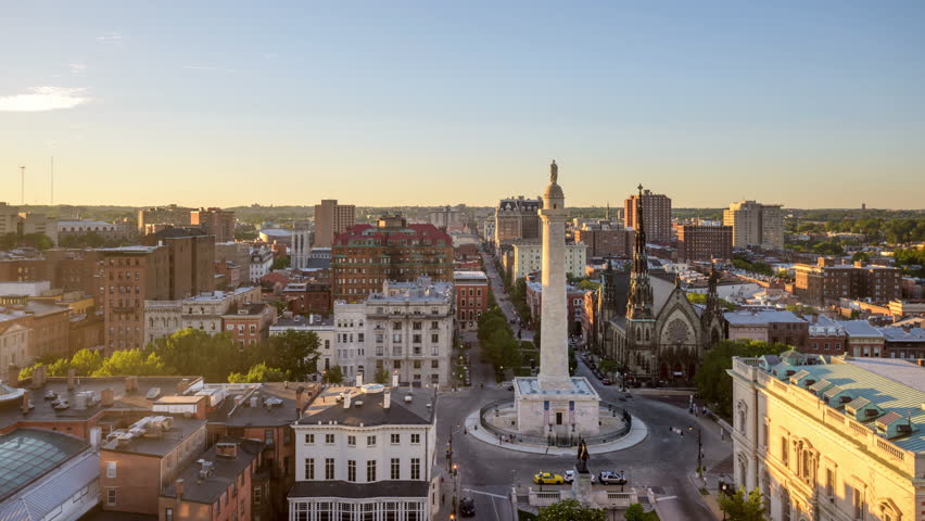 Baltimore, Maryland, USA cityscape at Mt. Vernon traffic circle and the Washington Monument.
