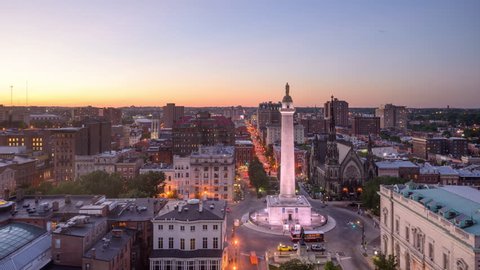 Baltimore, Maryland, USA cityscape at Mt. Vernon traffic circle and the Washington Monument.