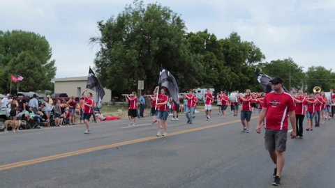 FOUNTAIN GREEN, UTAH - JUL 2016: High School marching band rural community parade. Fourth of July, American celebration freedom in small rural town. Parade reflects community values and family morals.