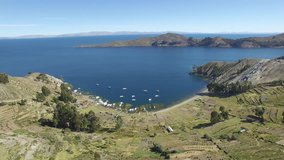 4K Aerial shot of boats at lake Titicaca and isla del sol forward
