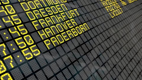 Close-up of an airport departure board to German cities destinations, with environment reflection.Part of a series.  4k video resolution (4096x2304).