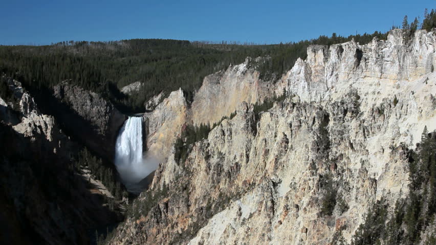 Beautiful Lower Yellowstone Falls. Several hundred feet tall falling from the river into the Grand Canyon of the Yellowstone. Wyoming. National Park nature and wilderness area. 