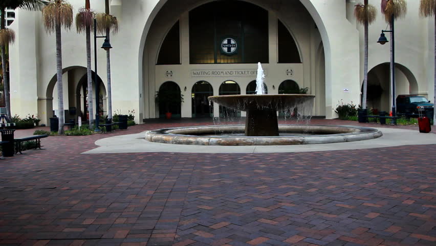 SAN DIEGO, CALIFORNIA - Santa Fe Train Station entrance. Featuring a working fountain and travelers.