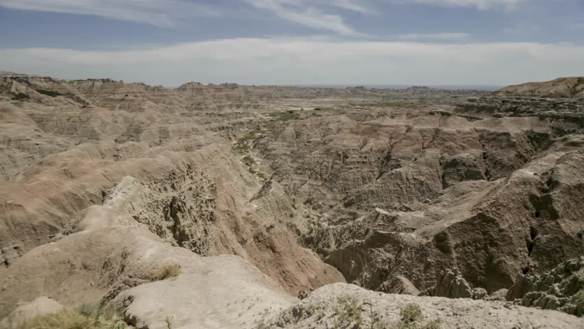 Wide Shot of Clouds and Tourists Visiting South Dakota