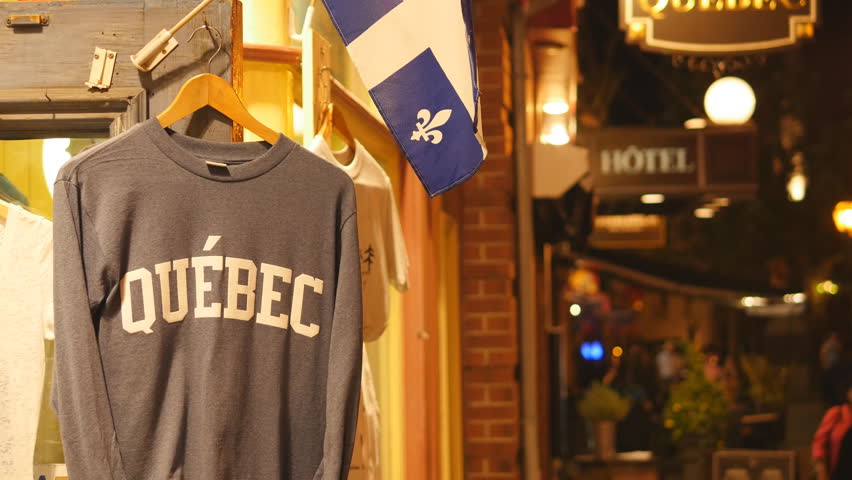 Quebec shirt and flag outside tourist shop. Quebec City, Canada.
