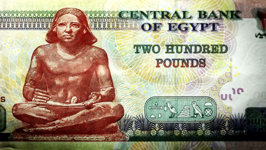 Pound bill Egyption money burning in flames, economic crisis or inflation concept. UHD