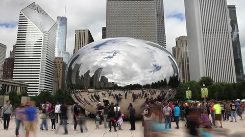 CHICAGO - SEPTEMBER 5, 2011 - Time lapse, a crowd of tourists at the Cloud Gate Sculpture in Millennium Park