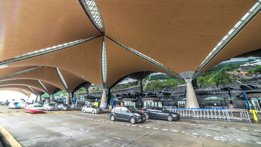 Transport parking in relegation zone in the Kuala Lumpur International Airport KLIA. 4K Timelapse - Kuala Lumpur, Malaysia, June 2016.