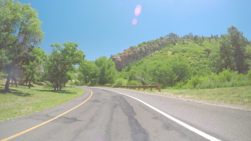 Car driving on South Wadsworth Blvd.-POV point of view.