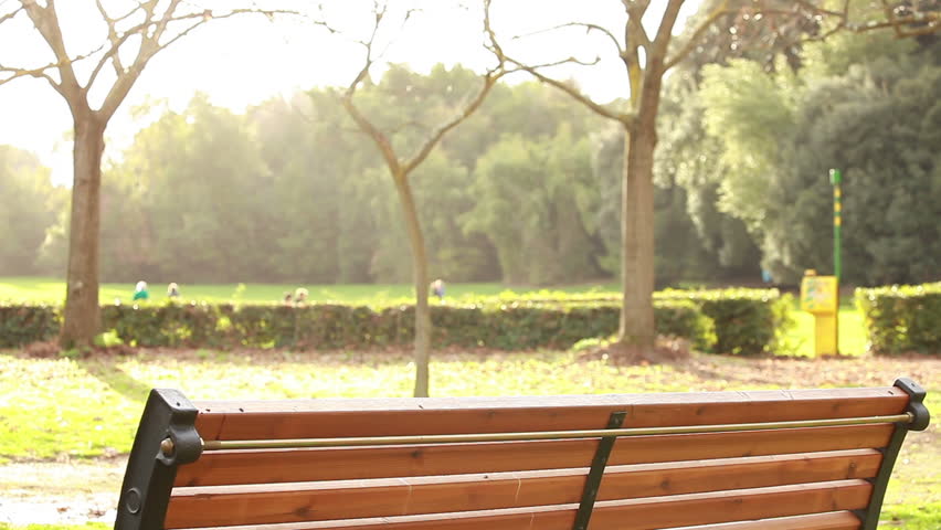 Boy at park with mp3 player
