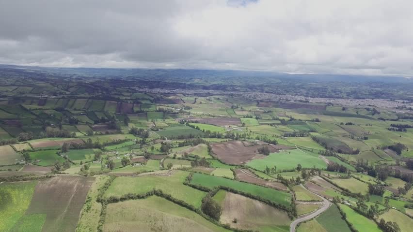 Aerial shot of agriculture fields in high mountains of Ecuador. 4k