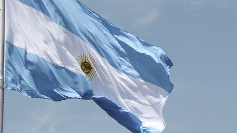 Flag of Argentina Against the Blue Sky.