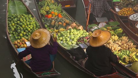 Fruits and vegetables were sold on boat the Damnoen saduak floating market is famous in Thailand