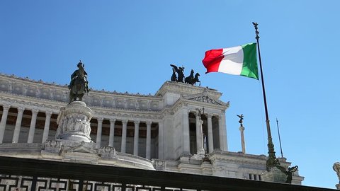 National Monument with italian flag Altar of the Fatherland, Vittoriano, the Italian patriotic symbols in Rome city