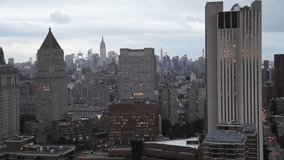 panning video of lower manhattan skyline with brooklyn bridge, shot from a high vantage point