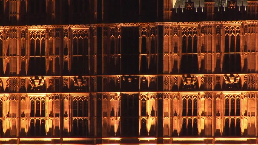 Close up of the House of Parliament illuminated with golden lights at night in London United Kingdom

