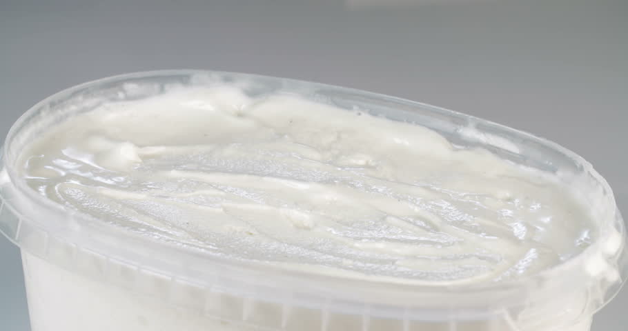 Macro shot of an ice cream scoop with Vanilla ice cream | Shutterstock HD Video #18232144