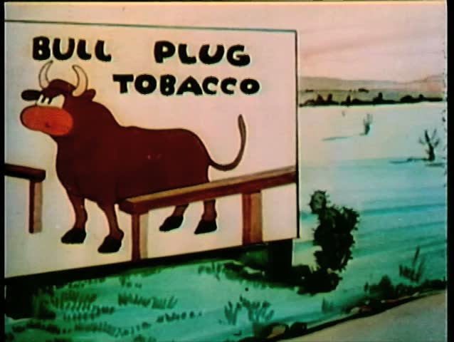 Bull running out of billboard