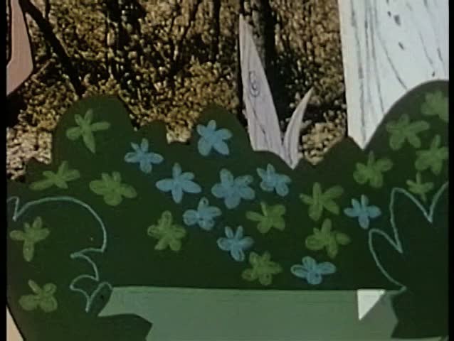 Cartoon of rabbit jumping out of bush