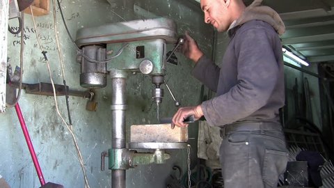 AMMAN, JORDAN - JUNE 14, 2009 - An unidentified Blacksmith doing iron work, blacksmith doing his duty.