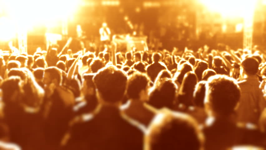 Cheering fans life concert seamless Iconic night rock concert crowd cheering slomo, Night rock concert, People cheer move lift clap their hands unison against strobing stage lights Computer generated Royalty-Free Stock Footage #18248524